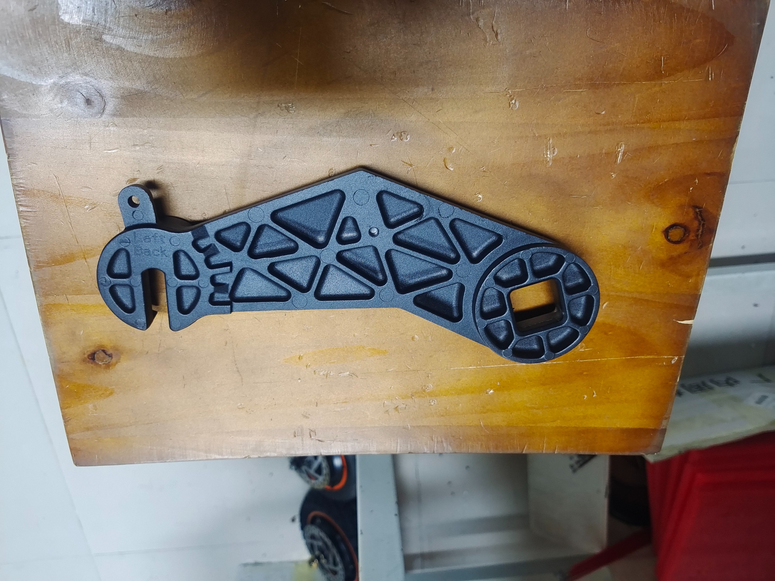 G3 Rear shock arm -left